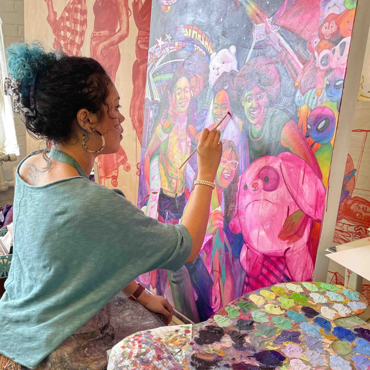Leslie Barlow painting in her studio